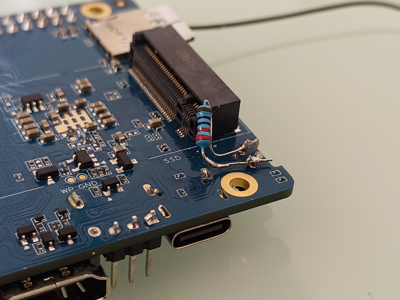 Resistor keeping button pressed